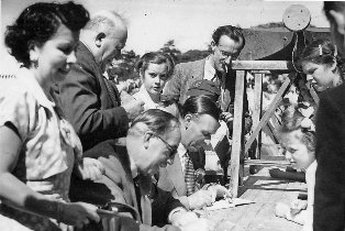 Harry Allen, Jack Radcliffe & Al Read signing autographs at a garden fete in Lowther Gardens, Lytham, 1951.