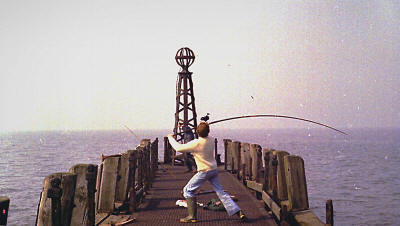 Fishing on the jetty, St.Annes Pier, in the 1980s.