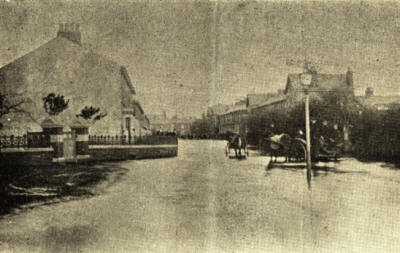Poulton Road, Fleetwood. Floods extended as far as the Strawberry Gardens Hotel and did much damage to property. Poulton Road, Fleetwood. Floods extended as far as the Strawberry Gardens Hotel and did much damage to property.