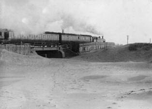 Sand drifts along the railway at Blackpool in 1914.