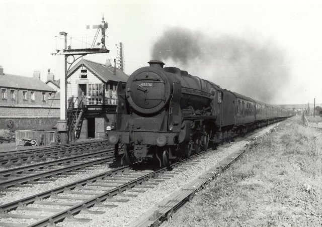 Train passing St.Annes Signal Box in 1959. St.Leonard's Road Bridge in the distance.