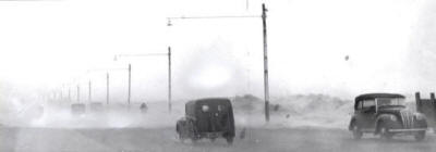 The age-old problem of blowing sand, seen here drifting across Clifton Drive, St.Annes, in 1952.