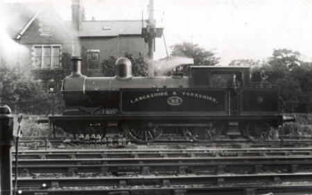 Locomotive in the sidings at Lytham c1920. The house behind is 