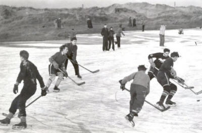 Playing Ice hockey in the sand dunes, Fairhaven, January 1952.