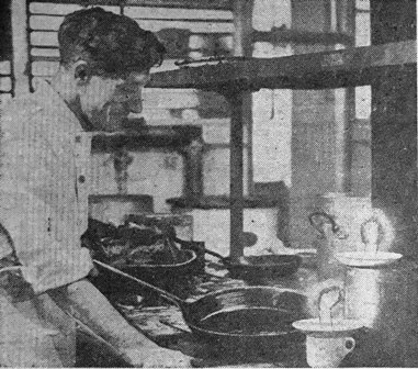 Blackpool, mid-February, 1947. Cooking by gas & candlelight during the power cuts.